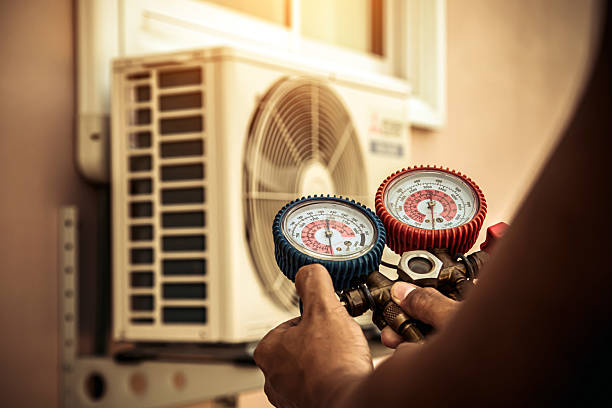 Professional Hvac technician working in Queens Village, NY